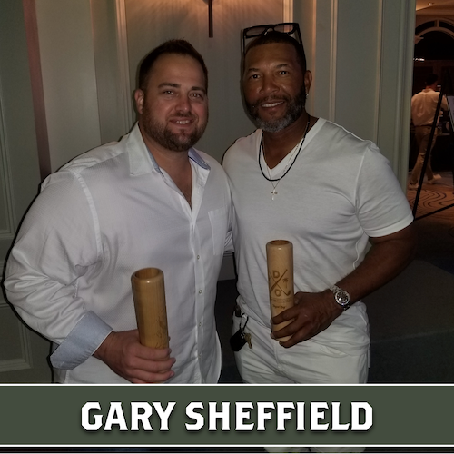 Gary Sheffield  holding a wooden Dugout Mugs baseball bat mug